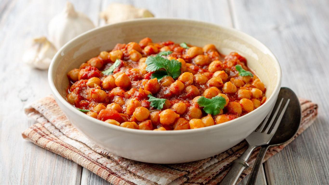 Bowl of chickpea stew with garnish