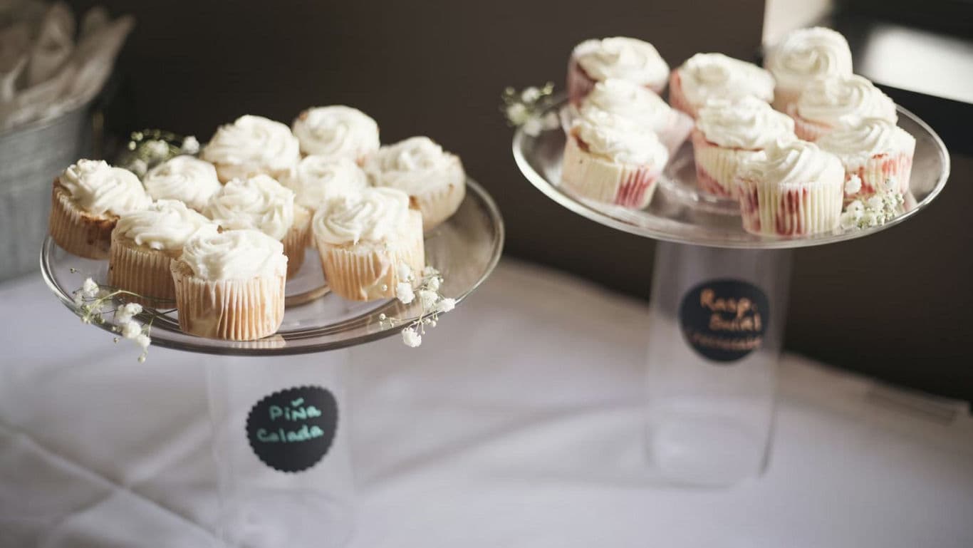 Cupcakes displayed on glass stands