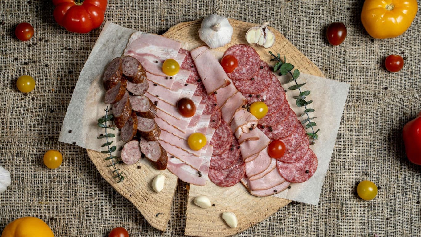 Cured pork meat on a platter.
