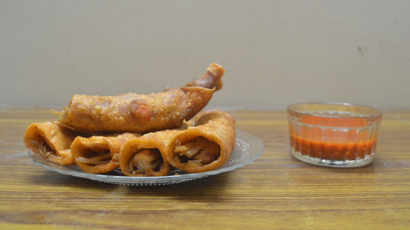 Crispy Fried Spring Rolls with Red Dipping Sauce