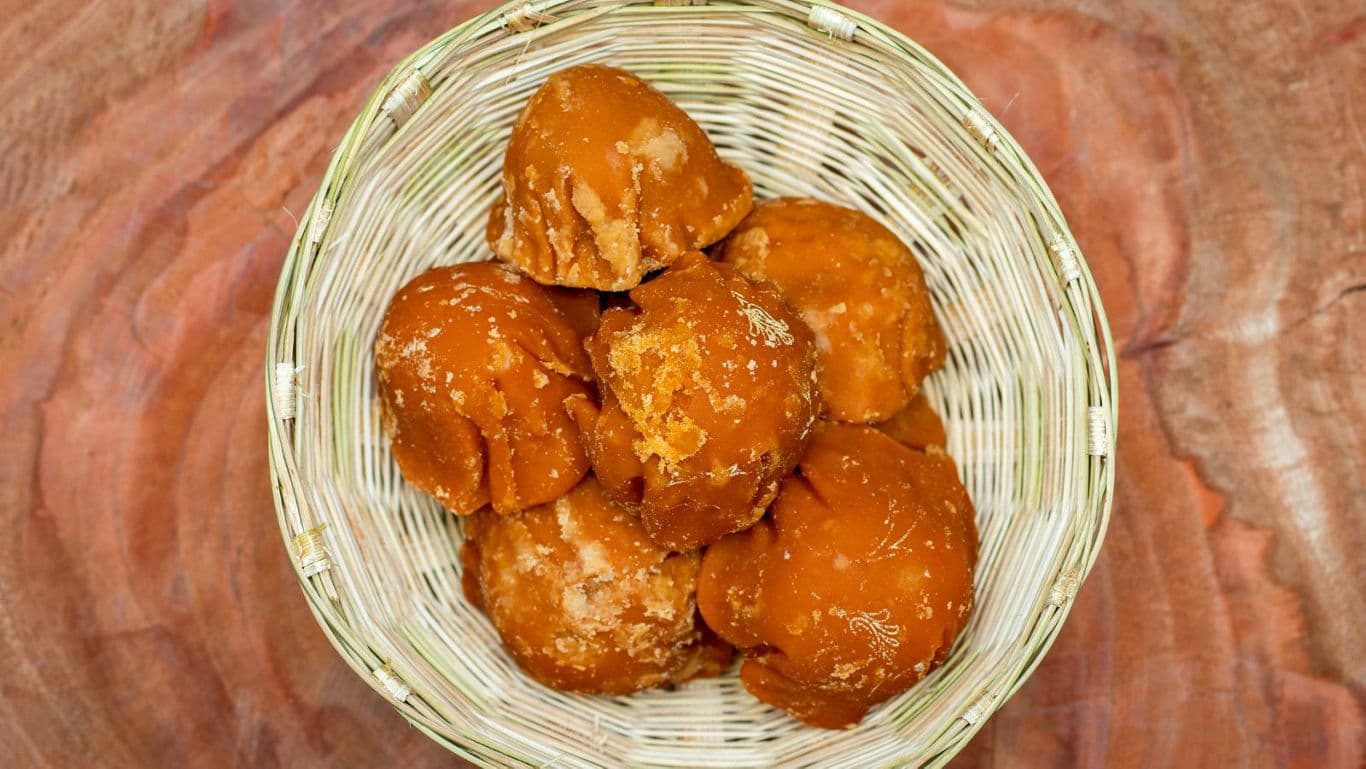 Brown sugar jaggery balls in woven basket