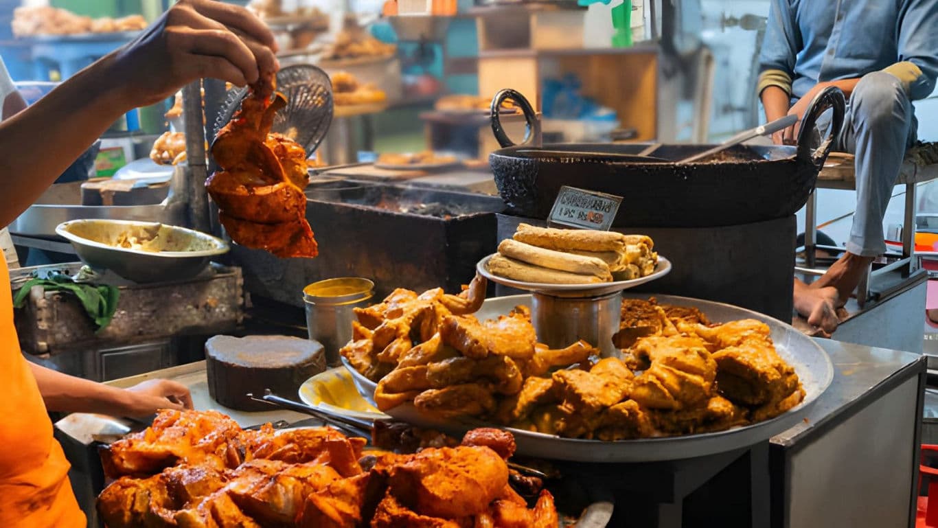 Street food stall with grilled chicken