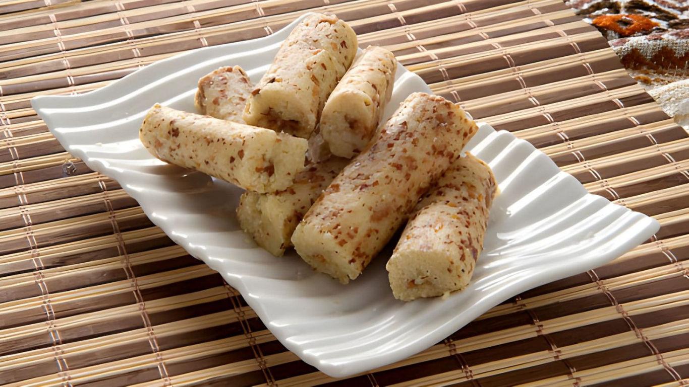 Rolled snacks on white plate
