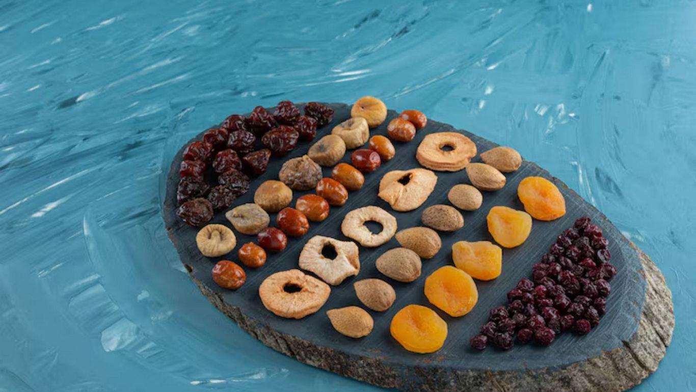Assorted dried fruits on slate platter