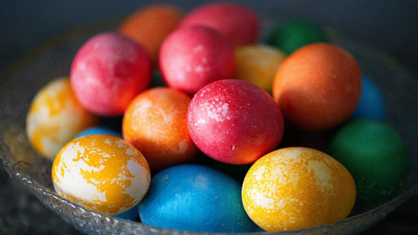 Colorful Dyed Eggs Arranged in Glass Bowl