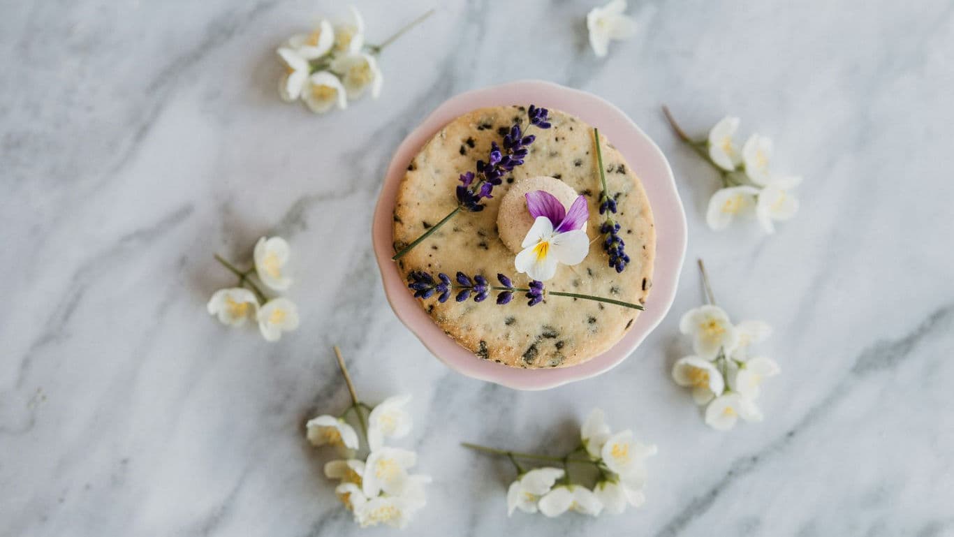 Floral shortbread cookie on marble background