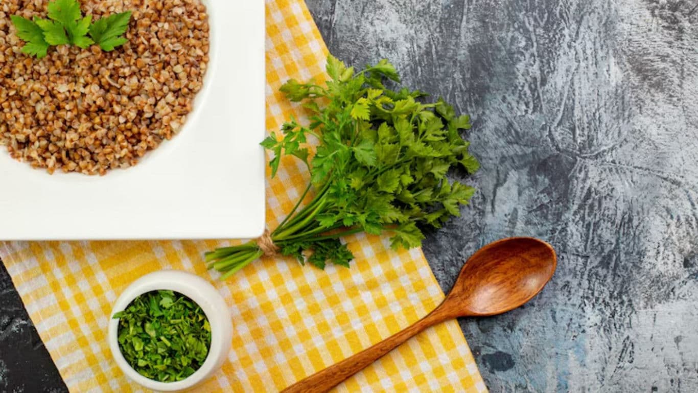 Cooked buckwheat with fresh parsley garnish