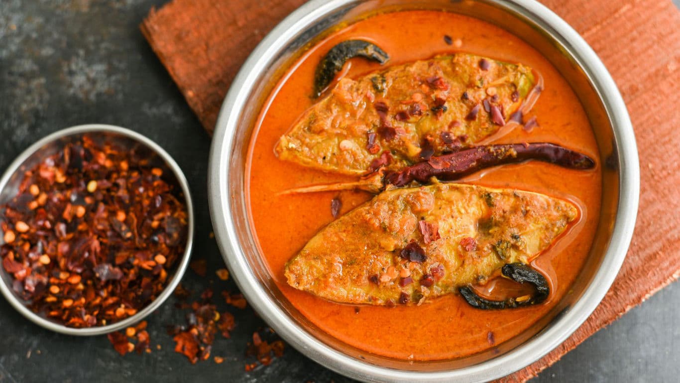 Spicy fish curry with chili flakes