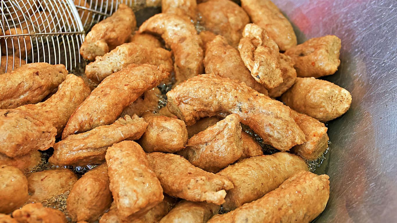 Freshly Fried Fish Cakes in Hot Oil