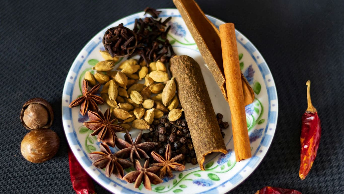 Assorted Whole Spices on Decorative Plate