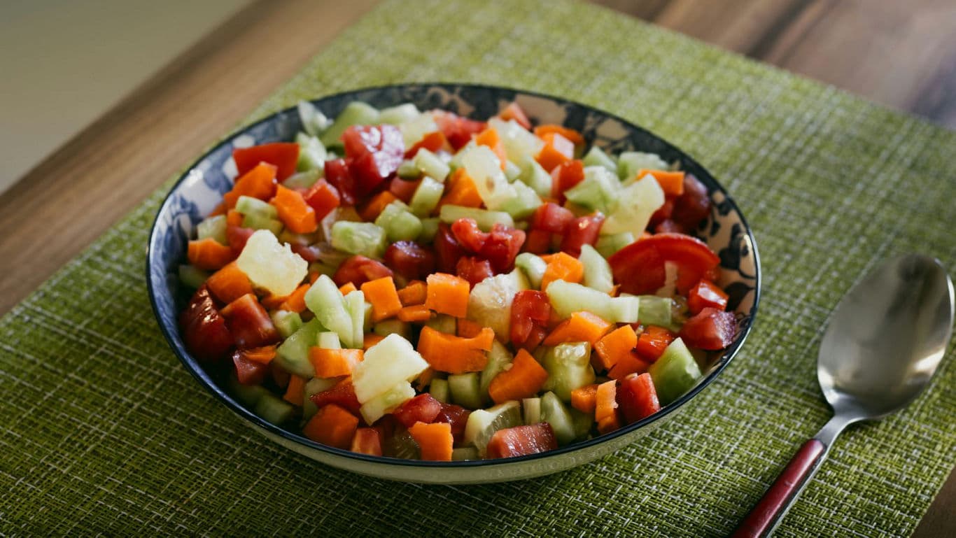Colorful chopped vegetable salad in bowl