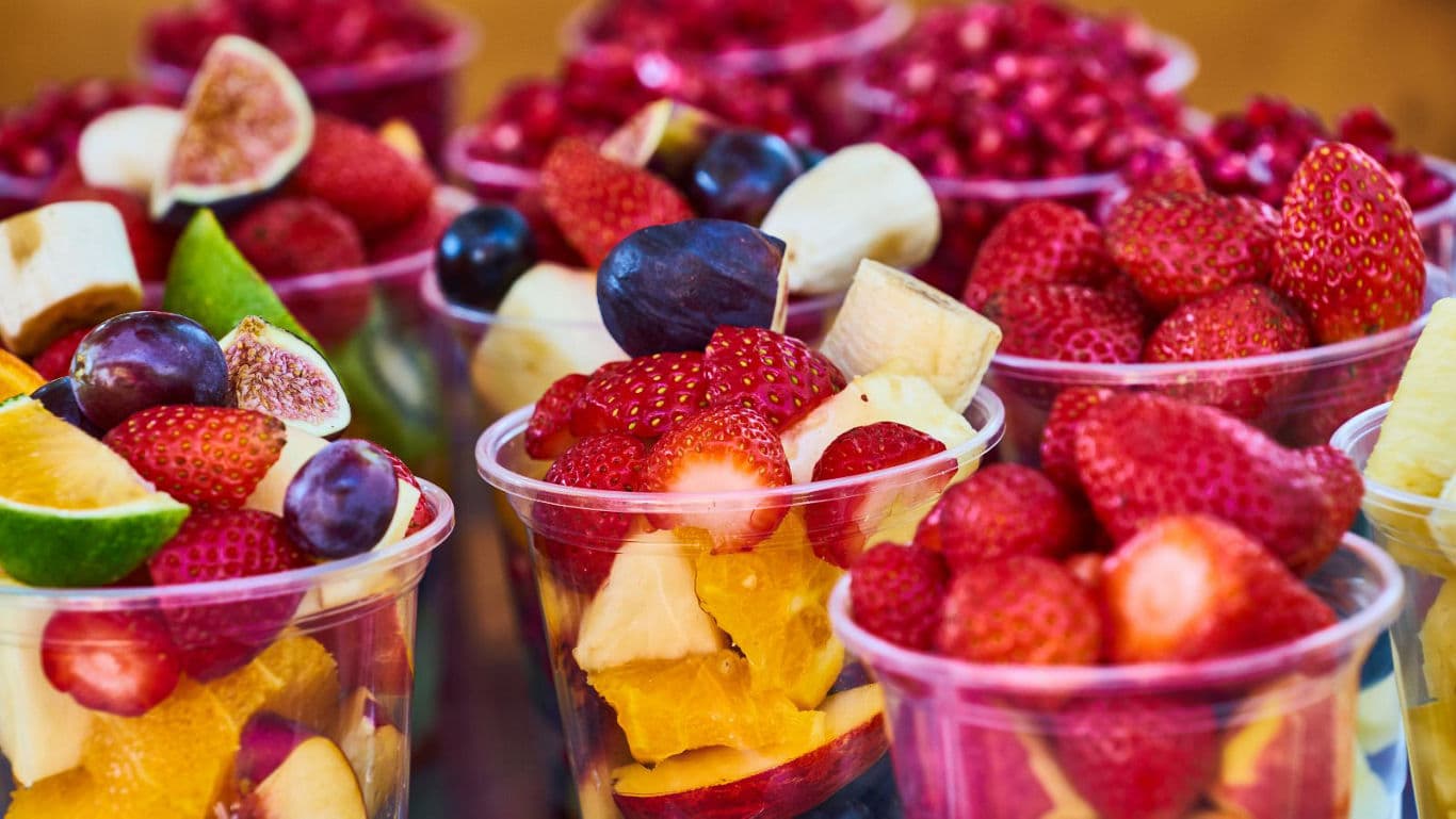 Assorted Fresh Fruit Cups with Strawberries and Grapes