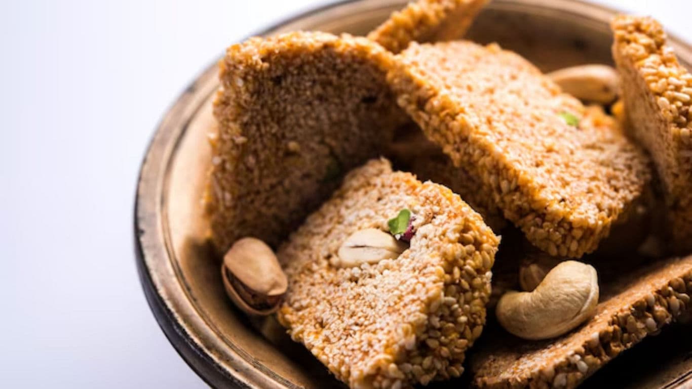 Sesame brittle with nuts in bowl