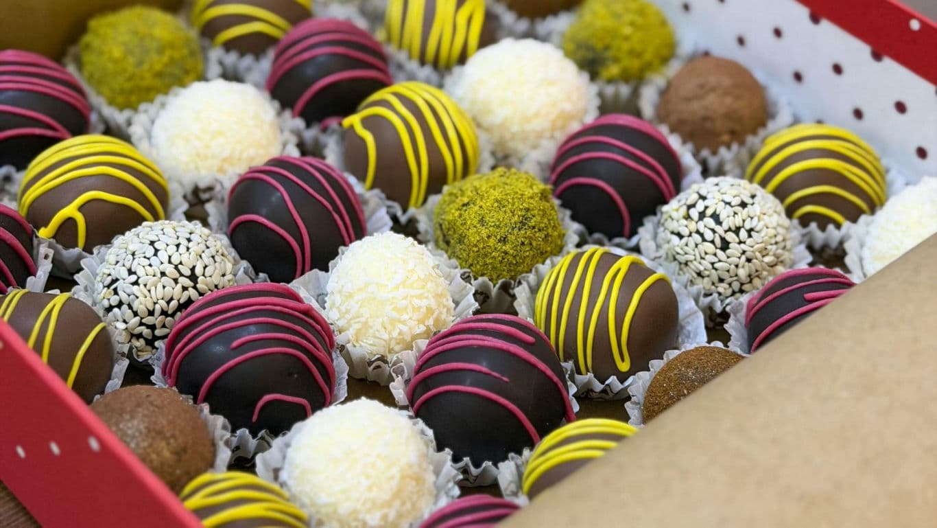 Assorted gourmet chocolate truffles in gift box