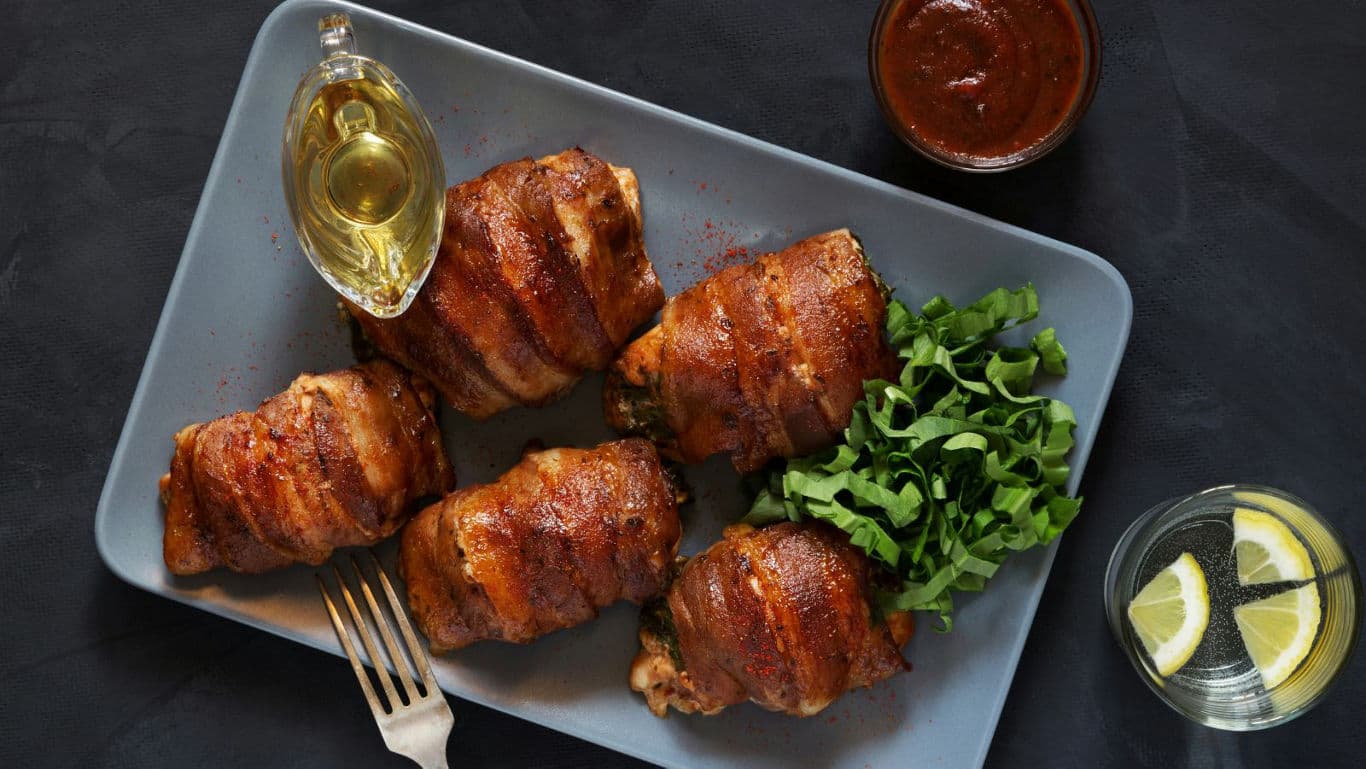 Bacon Wrapped Chicken Thighs with Fresh Greens