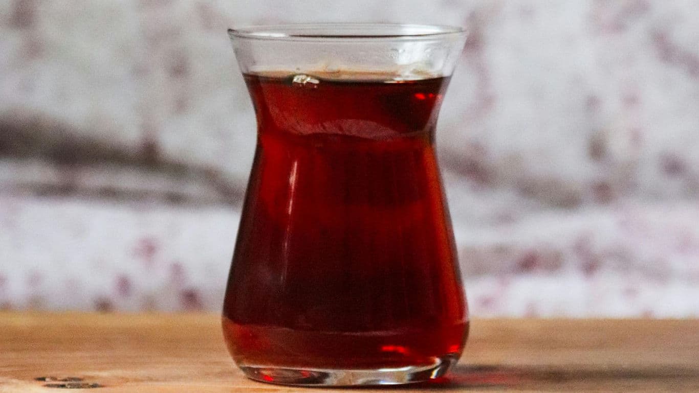 Traditional Turkish Tea in Curved Glass on Table