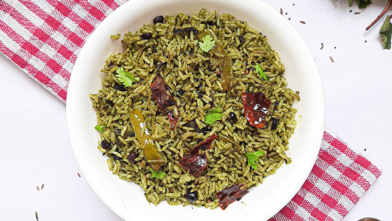 Spicy green herb rice in white bowl