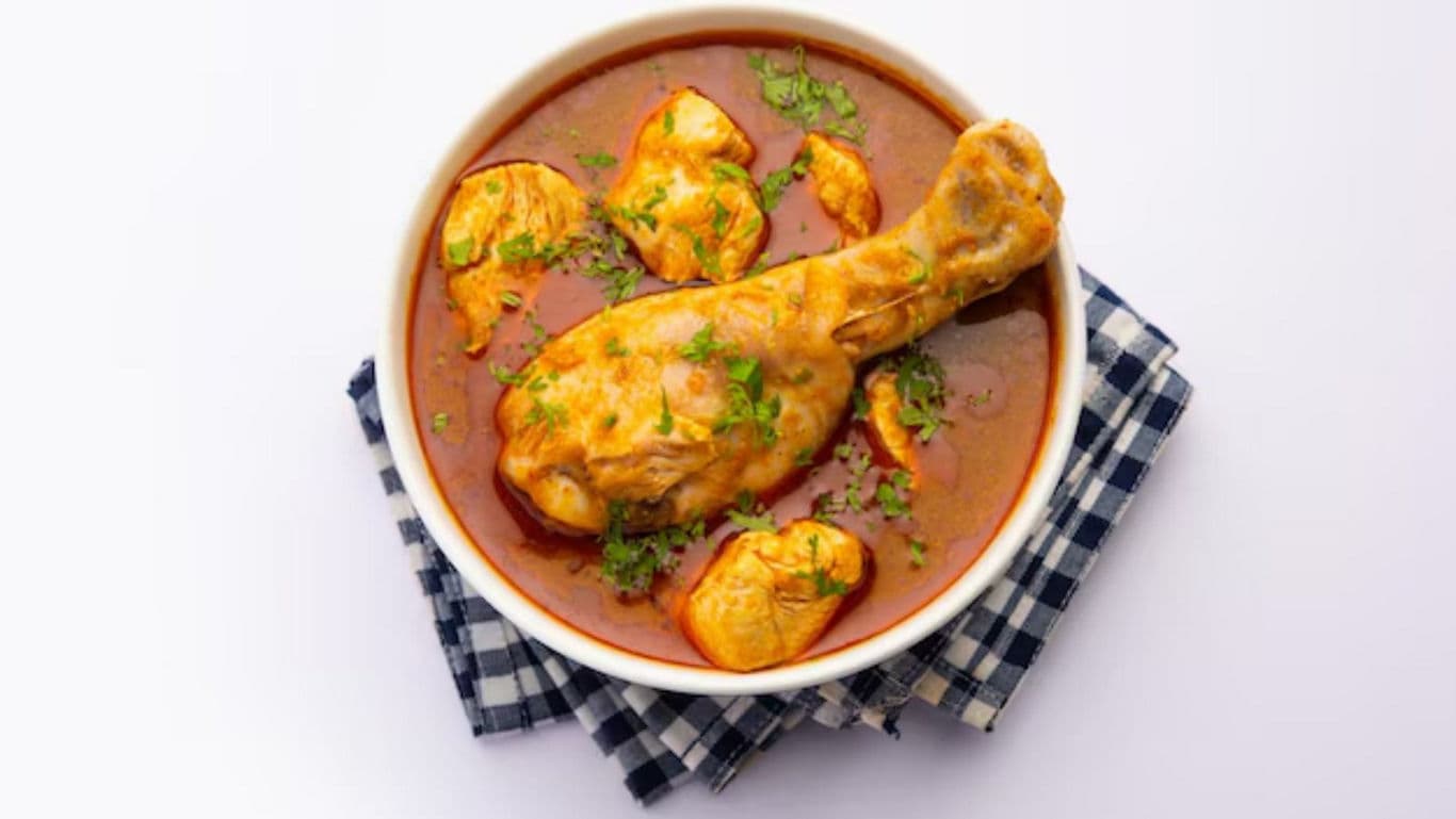 Chicken drumstick in rich curry sauce