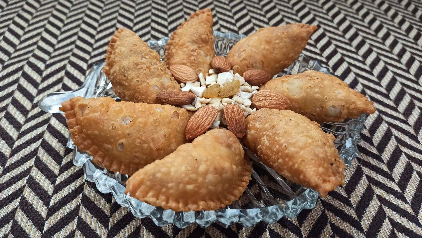Traditional fried pastries with nuts display