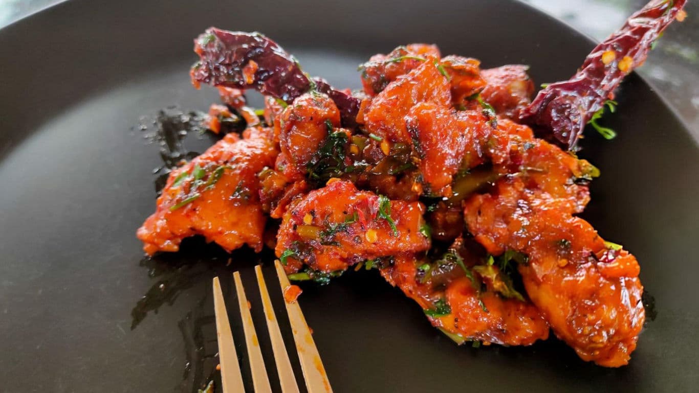 Spicy Fried Chicken on Black Plate