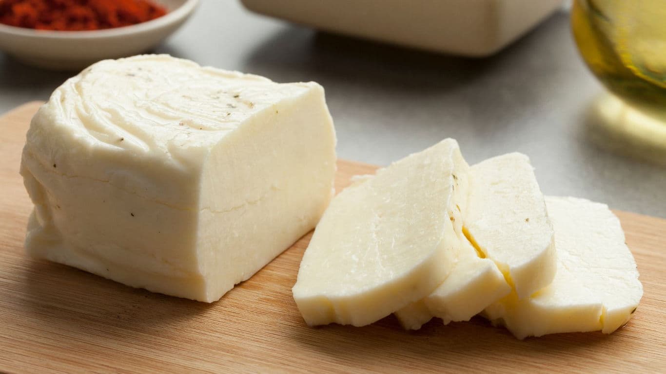 Halloumi cheese on a cutting board