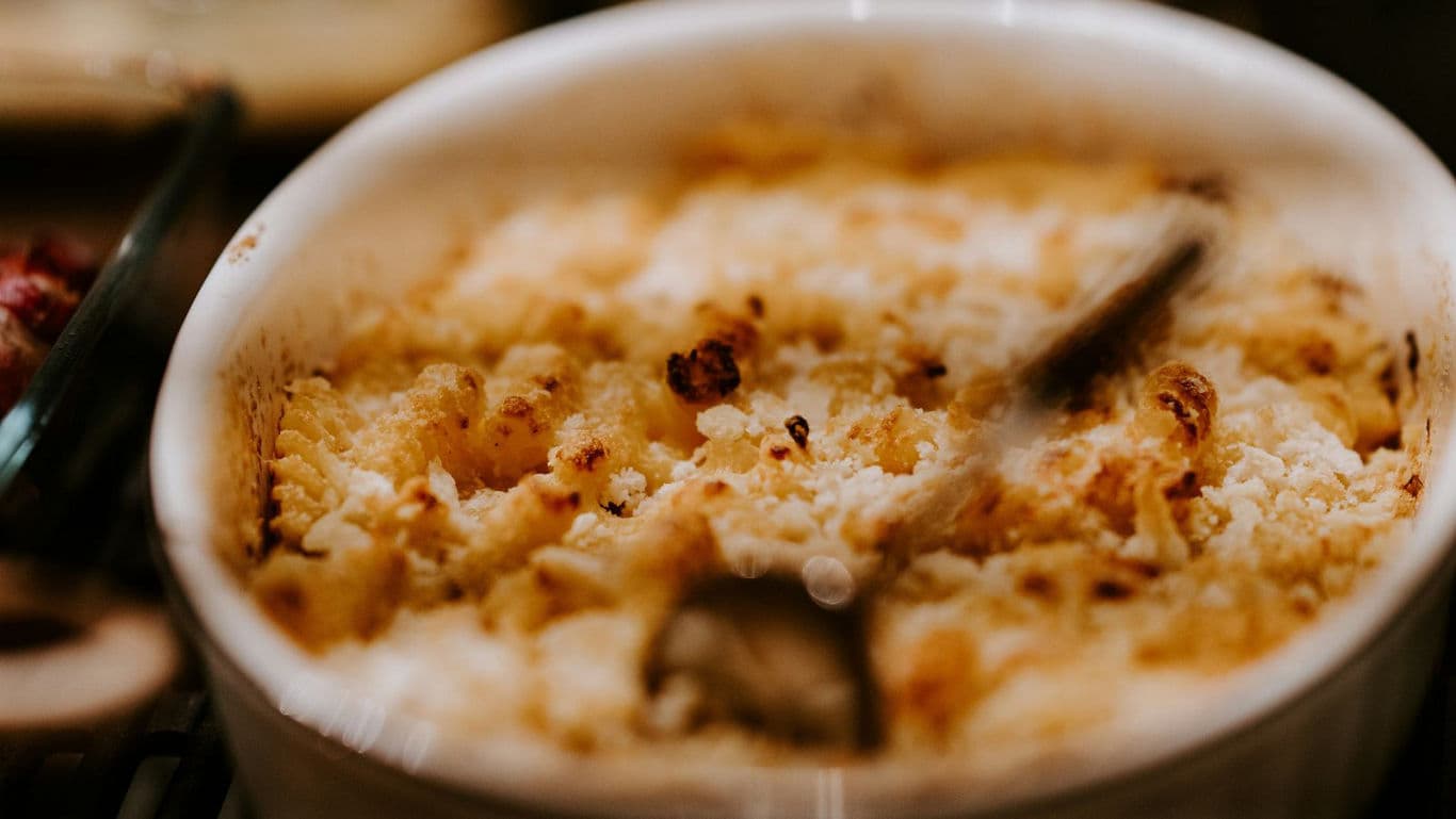 Golden Baked Casserole in White Ceramic Dish