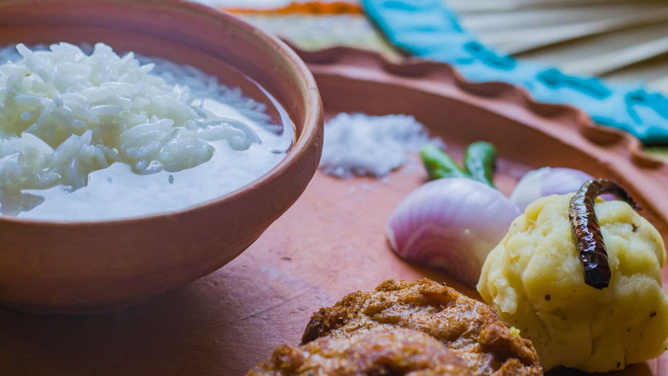 Traditional Indian meal with rice and sides
