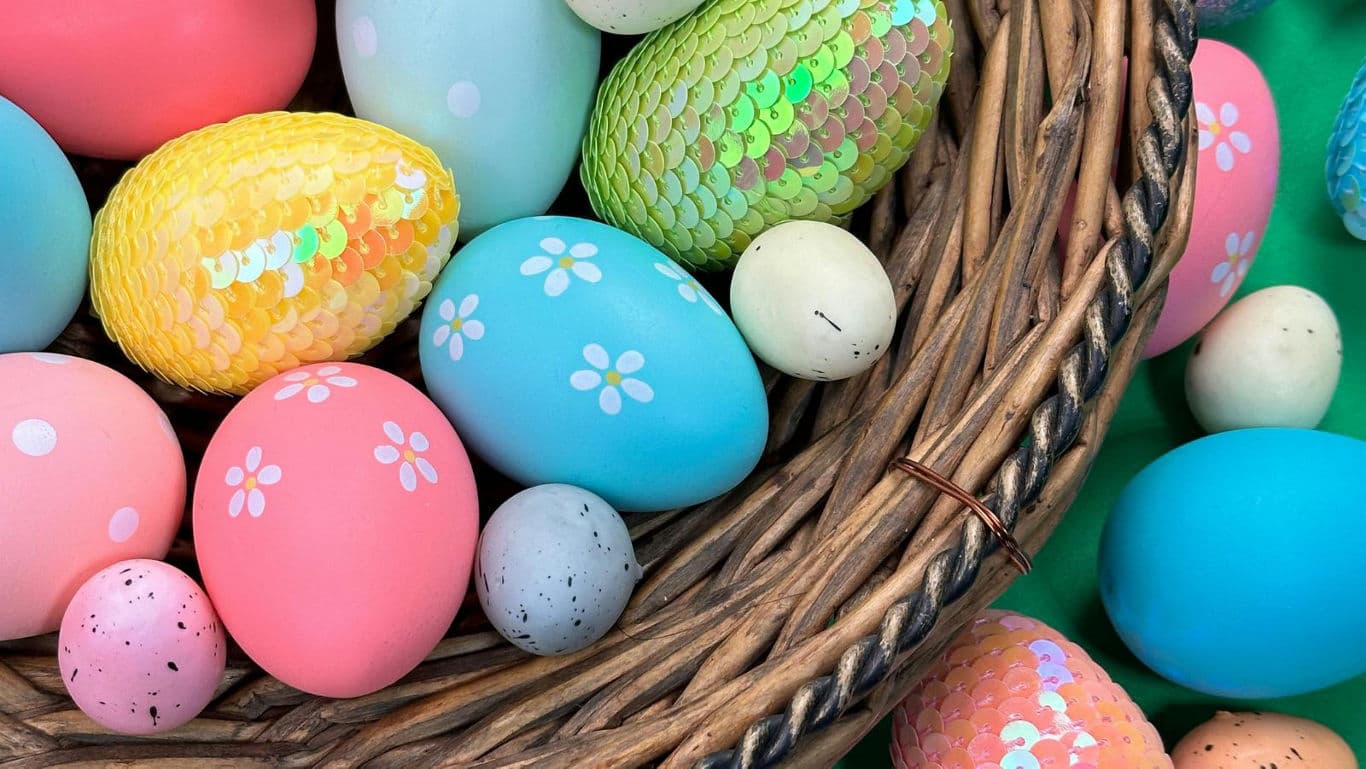 Colorful Decorative Easter Eggs in Wicker Basket