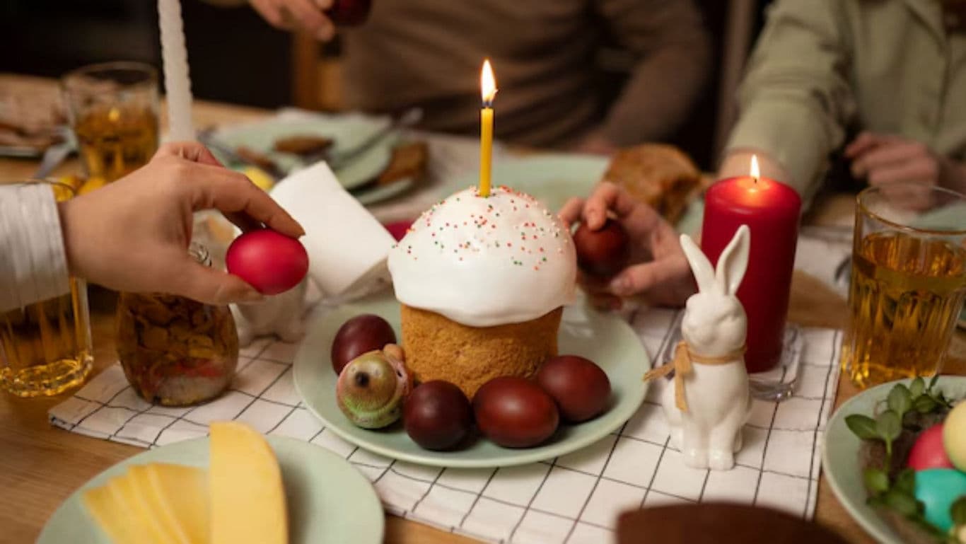 Festive Easter Table with Cake and Colored Eggs
