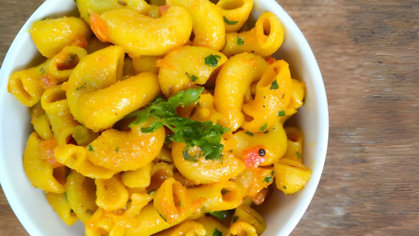 Bowl of Curried Macaroni Pasta with Herbs