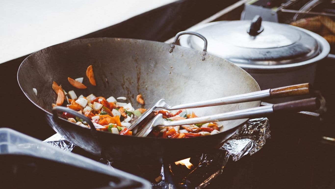 Vegetable Stir Fry Cooking in Large Wok Outdoors