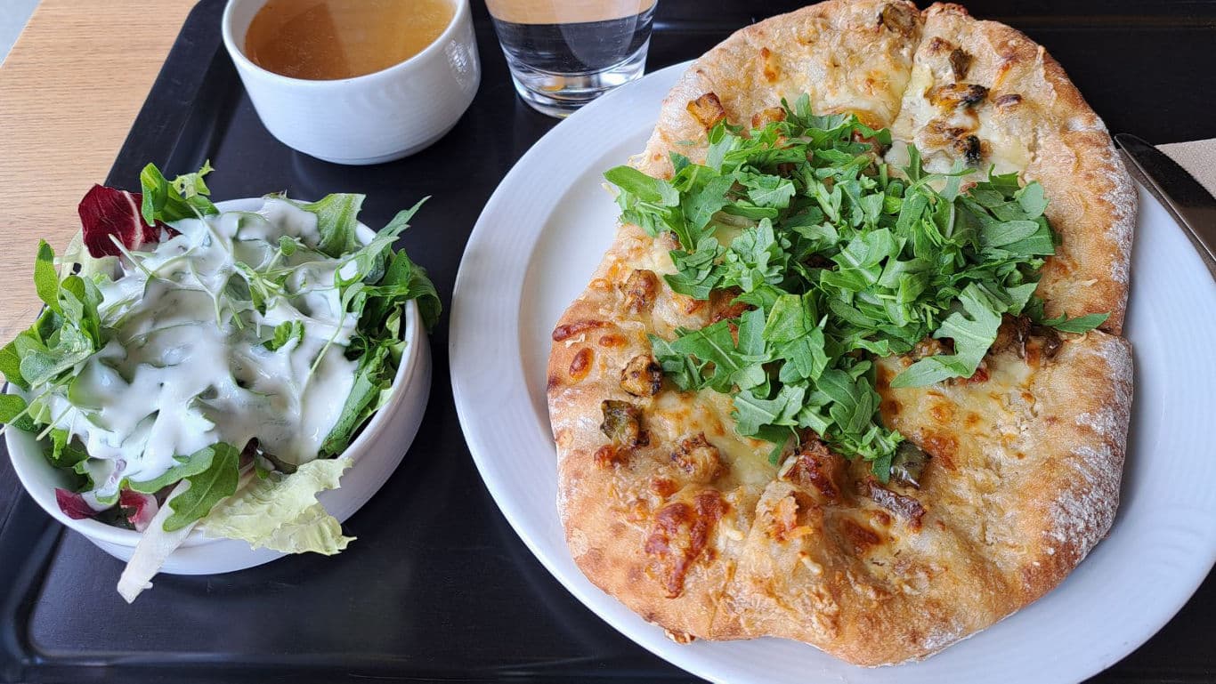 Fresh flatbread with salad and dressing