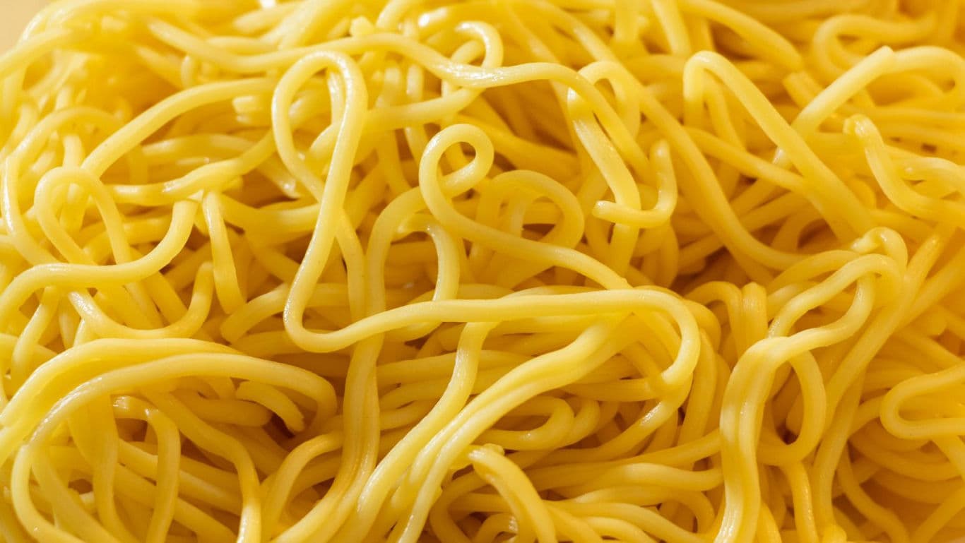 Close up of cooked yellow noodles