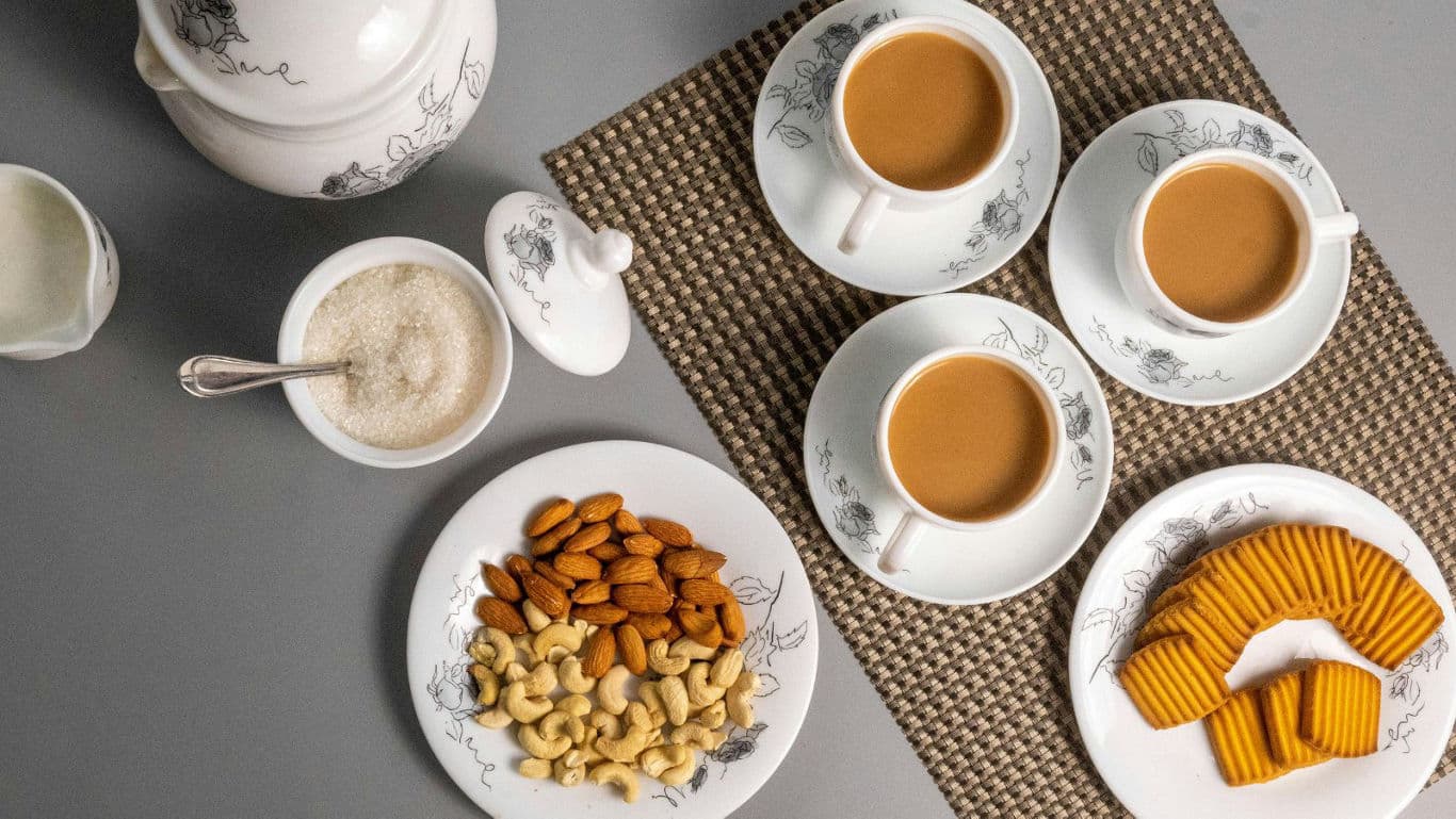 Tea time with biscuits and mixed nuts