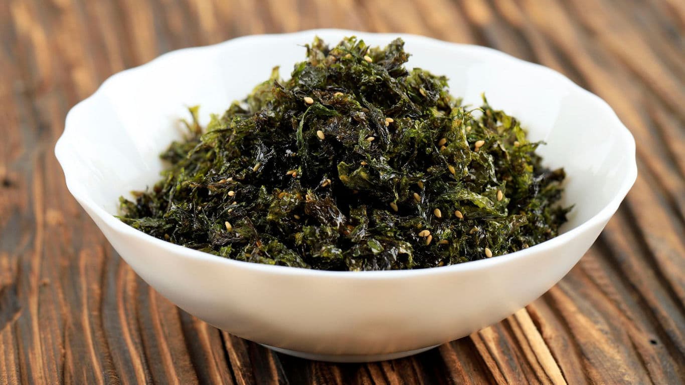 Seasoned seaweed salad in white bowl