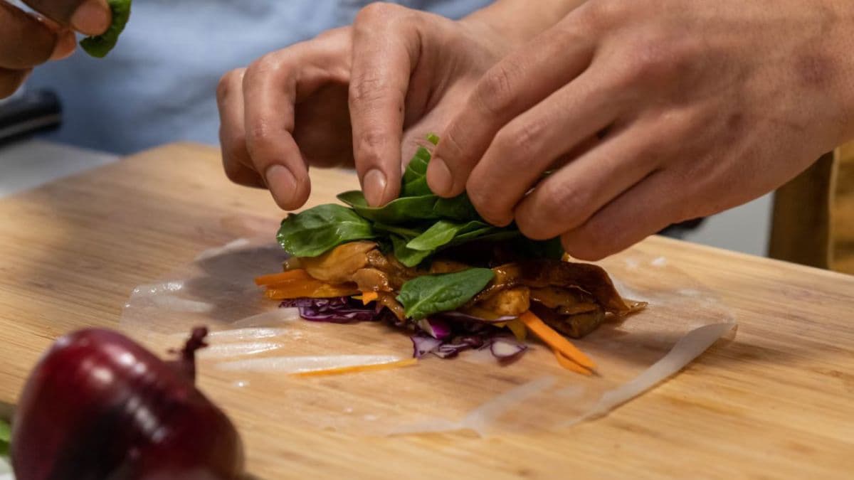 adding filling to wet rice paper