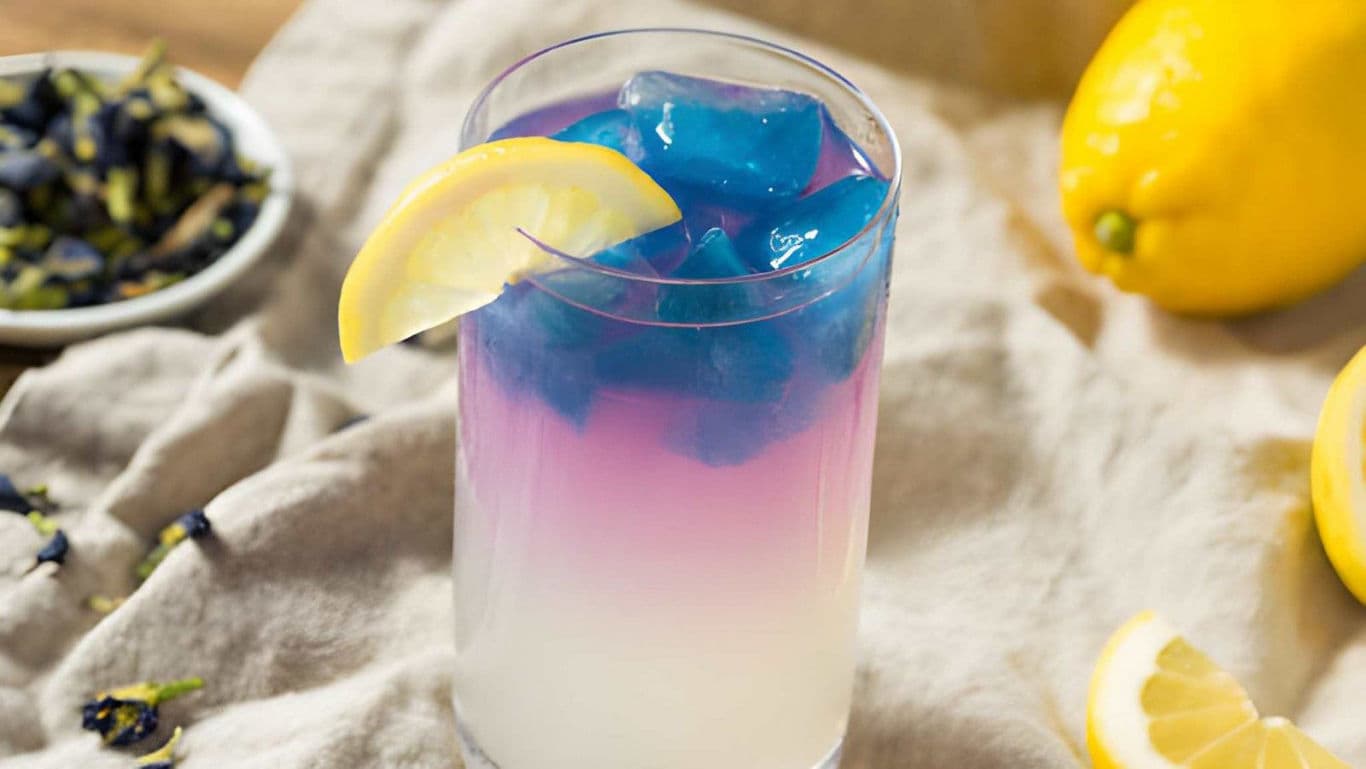Colorful Butterfly Pea Lemonade with Lemon Garnish