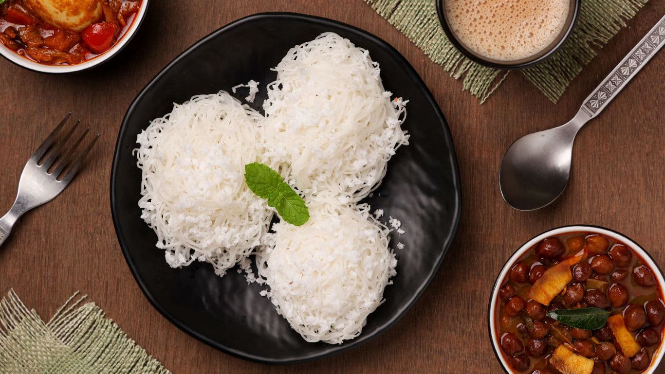 Traditional South Indian Idiyappam with Curry and Tea