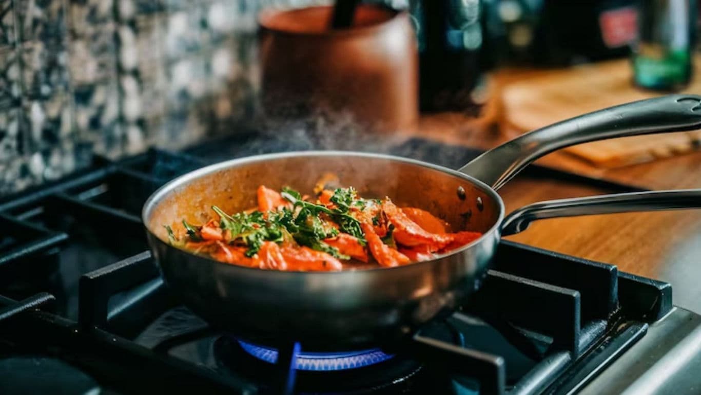Vegetable Stir Fry Cooking in Stainless Pan