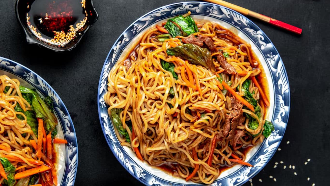 Asian noodle dish with vegetables and beef