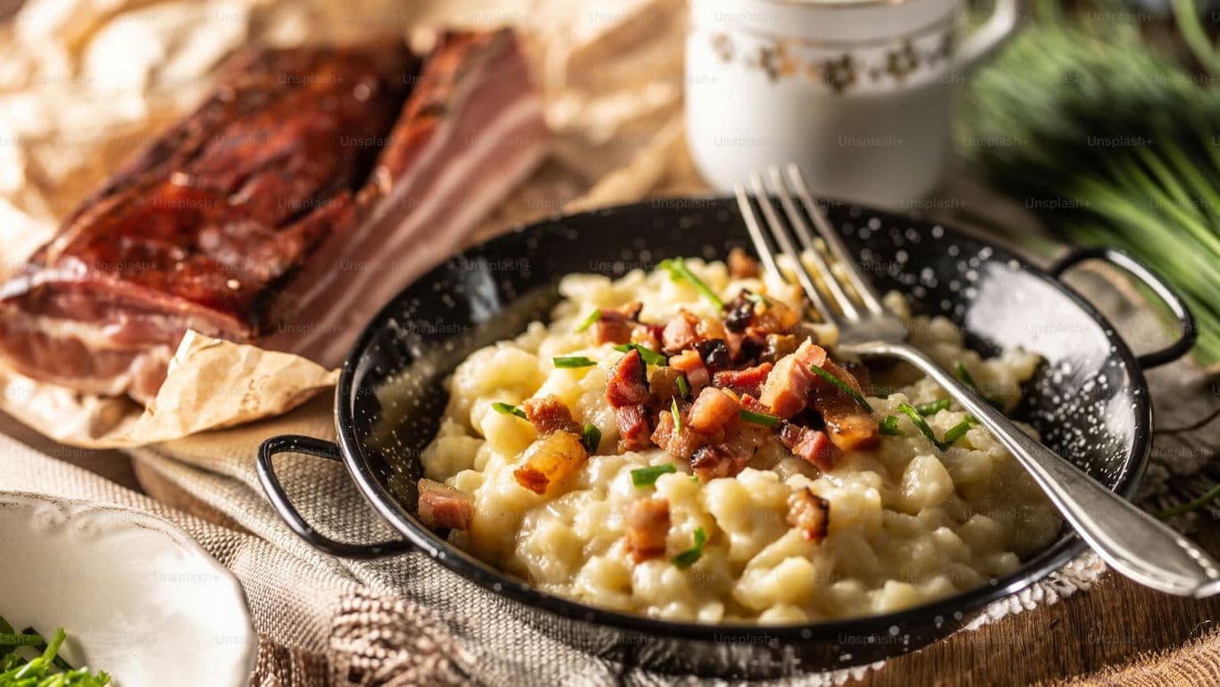 Rustic potato dumplings with bacon and herbs