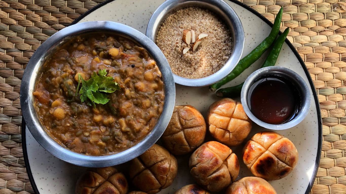 Traditional Indian dal baati meal on plate