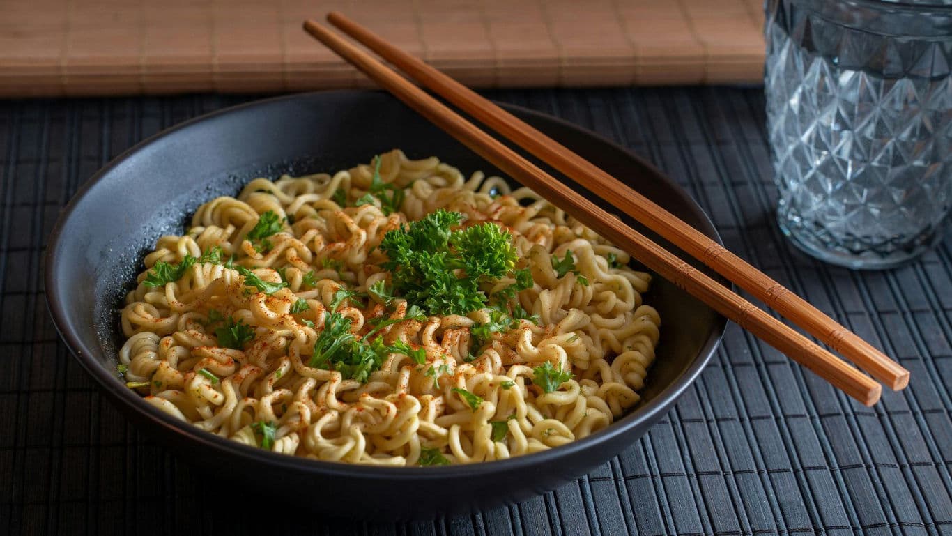 Bowl of noodles with chopsticks