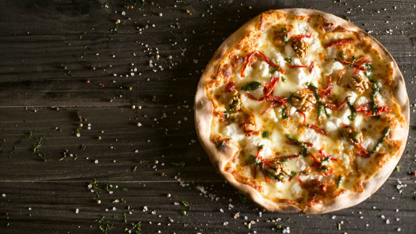Italian pizza with herbs.
