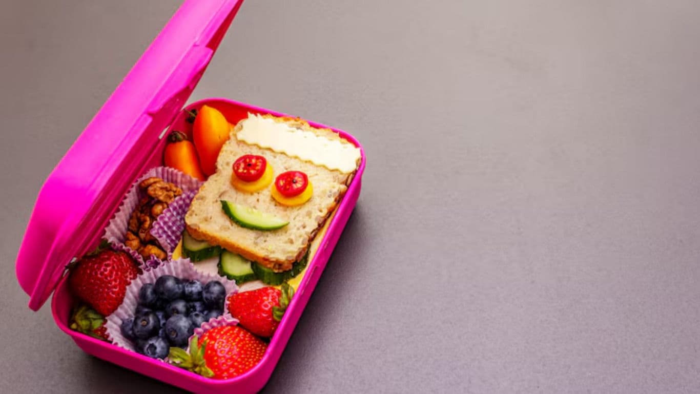Colorful lunchbox with healthy snacks