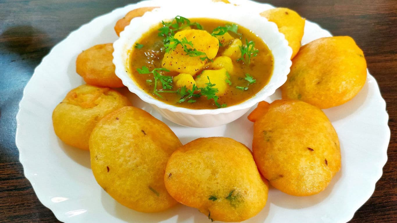 Indian puri with potato curry on plate