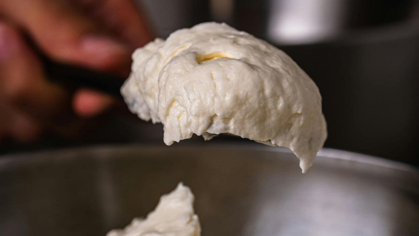 Close-up of spoonful of bread dough