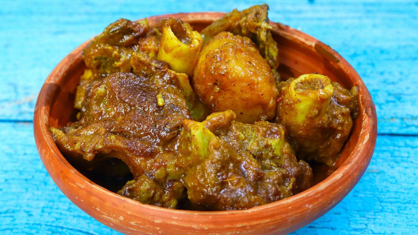 Mutton rezala in its mil, creamy Mughlai gravy