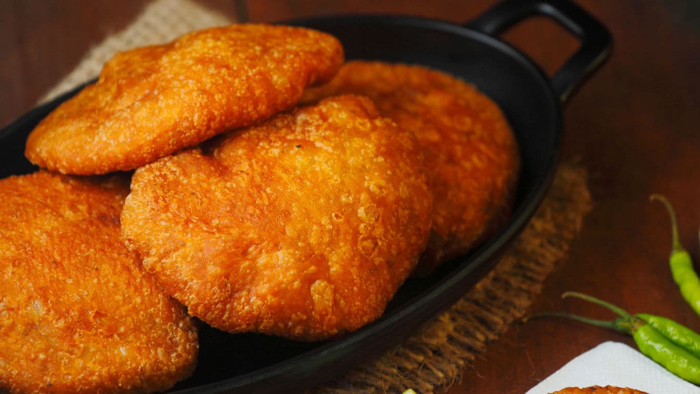 Crispy fried bread served in black skillet