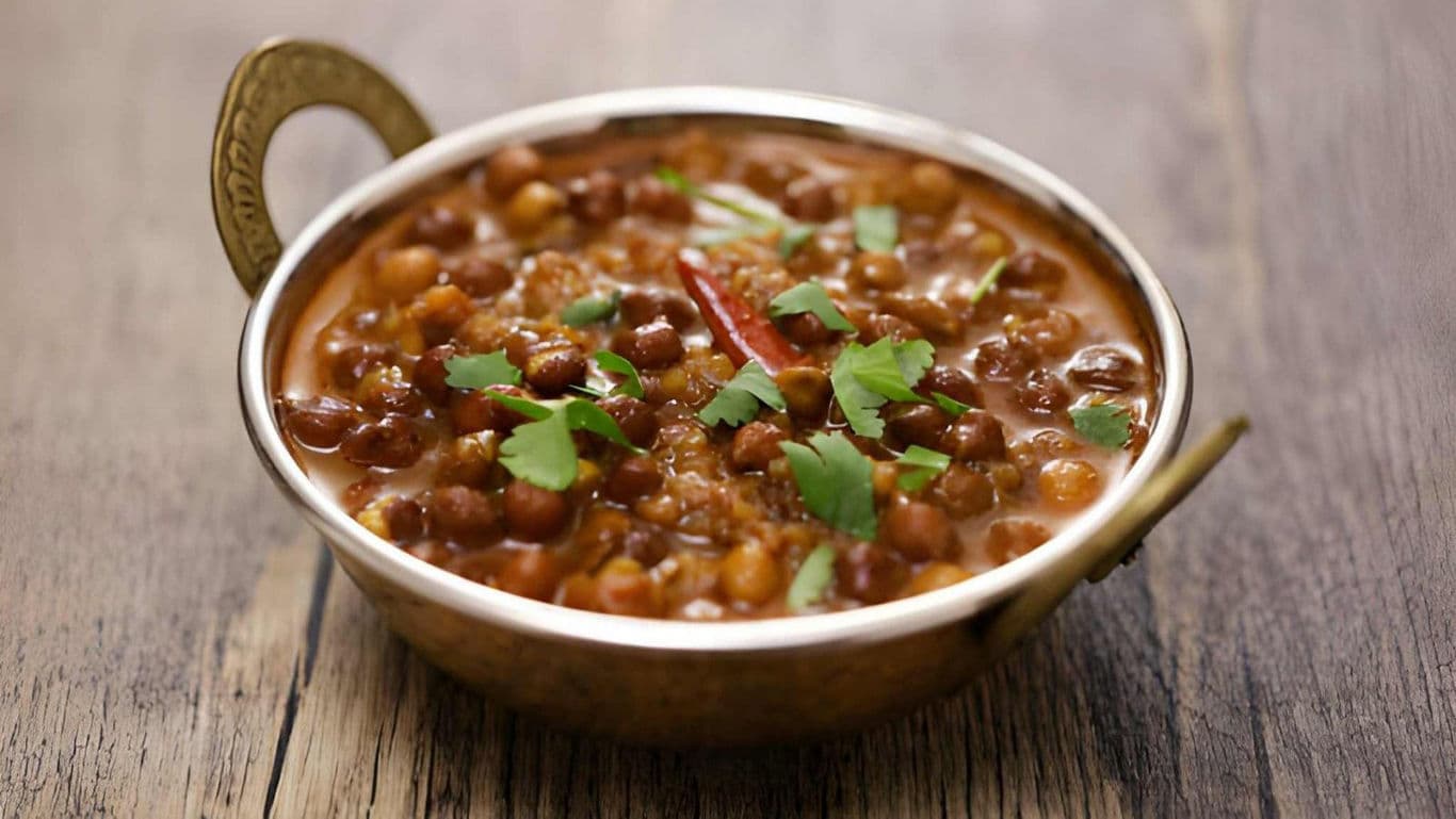 Traditional Indian Chickpea Curry in Brass Bowl